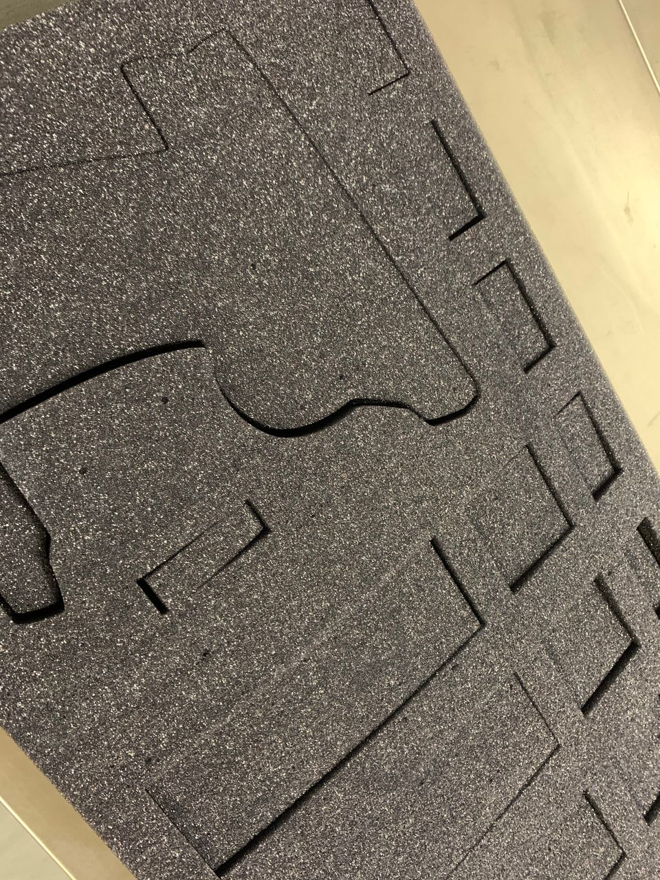 Laser cut and etched work by Proto.Hub