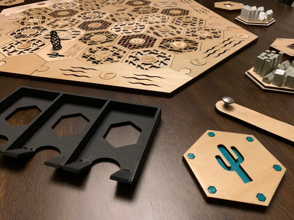 Laser cut and etched work by Proto.Hub
